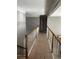 Hallway with wood railings and crown molding at 2550 Lynshire Ln, Snellville, GA 30078
