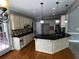 Bright eat-in kitchen with a center island, stainless steel appliances, and ample storage at 2550 Lynshire Ln, Snellville, GA 30078
