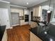 Kitchen features stainless steel appliances, traditional cabinetry, and hardwood floors at 2550 Lynshire Ln, Snellville, GA 30078