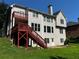 Exterior of home features a deck and backyard at 2550 Lynshire Ln, Snellville, GA 30078