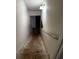 A long staircase descending to a lower level of the home at 2550 Lynshire Ln, Snellville, GA 30078