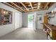 Basement room with open door overlooking the inground pool at 2775 Harper Ferry Dr, Lawrenceville, GA 30044