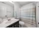 Bathroom featuring a shower-tub combo and a single sink vanity at 2775 Harper Ferry Dr, Lawrenceville, GA 30044