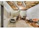 Unfinished basement offers ample space for storage with exposed ceiling and concrete floor at 80 Jacob Trl, Rockmart, GA 30153