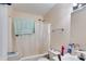 Bright bathroom featuring shower with curtain, vanity, and ample storage at 80 Jacob Trl, Rockmart, GA 30153