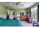 Bedroom with adjacent full bathroom showcases neutral walls, providing a relaxing, functional layout at 80 Jacob Trl, Rockmart, GA 30153