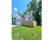 A spacious, lush green lawn is enclosed by a wood privacy fence at 1081 Hardin Street Sw St, Conyers, GA 30012