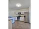 Kitchen with stainless steel appliances, white cabinetry, and granite countertops at 1081 Hardin Street Sw St, Conyers, GA 30012