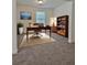 Cozy office space with natural lighting, a comfortable desk, and a bookshelf at 1081 Hardin Street Sw St, Conyers, GA 30012