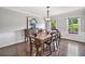 Formal dining room features hardwood floors, large windows, and modern decor at 1625 Bill Murdock Rd, Marietta, GA 30062