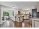 Spacious kitchen with stainless steel appliances, hardwood floors and a breakfast area at 1625 Bill Murdock Rd, Marietta, GA 30062