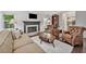 Cozy living room with fireplace, hardwood floors, and classic furniture at 1625 Bill Murdock Rd, Marietta, GA 30062