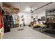 Epoxy-floor garage features storage, ceiling storage, and overhead garage door with automatic opener at 506 Broadview Ne Pl, Atlanta, GA 30324