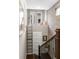 Unique hallway with a ladder leading to a cozy nook, adding character and charm to the home at 506 Broadview Ne Pl, Atlanta, GA 30324
