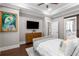 Stylish main bedroom featuring a modern dresser and ensuite bathroom creating a comfortable and private space at 506 Broadview Ne Pl, Atlanta, GA 30324