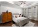 Serene main bedroom with shiplap accent wall, ceiling fan, and natural light creating a peaceful retreat at 506 Broadview Ne Pl, Atlanta, GA 30324