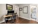 Home office featuring a modern desk and office chair and a bathroom in the background at 506 Broadview Ne Pl, Atlanta, GA 30324