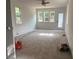Spacious bedroom with carpet flooring and large windows offering natural light at 5310 Lyndale Cir, Forest Park, GA 30297