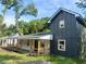 Attractive two-story house with a covered porch and gray siding at 5310 Lyndale Cir, Forest Park, GA 30297