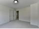 Cozy bedroom with neutral walls and two doors at 5485 Sandstone Ct, Cumming, GA 30040