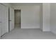 Spacious bedroom showcasing open doorway at 5485 Sandstone Ct, Cumming, GA 30040