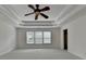 Large main bedroom featuring an elegant ceiling fan at 5485 Sandstone Ct, Cumming, GA 30040