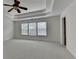 Spacious main bedroom with decorative ceiling at 5485 Sandstone Ct, Cumming, GA 30040