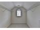 Walk in closet featuring overhead wire shelves and a window for natural light at 5485 Sandstone Ct, Cumming, GA 30040