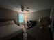 Inviting bedroom with desk, large window, and modern furnishings creating a comfortable and stylish interior at 127 Spring Way Sq, Canton, GA 30114
