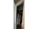 View inside the closet with visible shelves and clothes rack at 127 Spring Way Sq, Canton, GA 30114