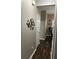 Hallway with modern decor and stylish wall art leading to other rooms at 127 Spring Way Sq, Canton, GA 30114