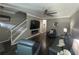 Stylish living room with hardwood floors and a modern electric fireplace at 127 Spring Way Sq, Canton, GA 30114