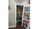 Walk-in pantry with white wire shelves, providing ample storage space for food and kitchen essentials at 127 Spring Way Sq, Canton, GA 30114