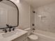 Modern bathroom with marble-look tile, sleek black fixtures, and a stylish vanity at 1723 Woodbow Path, Dacula, GA 30019
