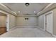 Partially finished room with modern lighting and potential for customization at 1723 Woodbow Path, Dacula, GA 30019