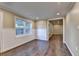 Open-concept living area with beautiful hardwood floors and natural light at 1723 Woodbow Path, Dacula, GA 30019