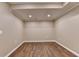 Cozy room with modern lighting, offering a blank canvas to create your ideal space at 1723 Woodbow Path, Dacula, GA 30019
