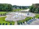 Community splash pad with interactive water features, lounge seating, and landscaping at 1723 Woodbow Path, Dacula, GA 30019