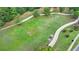 Aerial view of a large community sports field and walking trails with landscaping at 1723 Woodbow Path, Dacula, GA 30019
