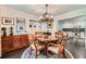 Elegant dining room with hardwood floors, chandelier, and view to kitchen at 350 Lamplighter Se Ln, Marietta, GA 30067
