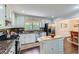 Cozy kitchen with stainless appliances, granite countertops, and a view to the dining area at 350 Lamplighter Se Ln, Marietta, GA 30067