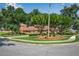 A well-manicured front yard frames this inviting home with a circular driveway and mature landscaping at 4063 Penhurst Dr, Marietta, GA 30062
