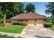 A two-car garage complements this charming home set on a well-maintained lot with established landscaping at 4063 Penhurst Dr, Marietta, GA 30062