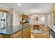 Spacious kitchen features stainless steel appliances, a breakfast bar, and a breakfast nook at 4063 Penhurst Dr, Marietta, GA 30062