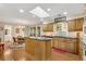 Well-lit kitchen features stainless steel appliances, a center island, and a breakfast nook at 4063 Penhurst Dr, Marietta, GA 30062