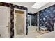 Detailed bathroom showcasing unique wallpaper, a walk-in shower, and a soaking tub at 4063 Penhurst Dr, Marietta, GA 30062