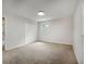 Spacious bedroom with neutral carpeting, double closet, and a bright aesthetic at 4601 Lindsey Dr, Powder Springs, GA 30127