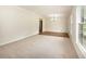 Inviting living room with lots of natural light and carpet flooring at 4601 Lindsey Dr, Powder Springs, GA 30127