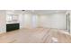 Open-concept living space featuring recessed lighting, hardwood floors, and an updated kitchen area at 4059 Big Valley Trl, Stone Mountain, GA 30083