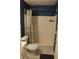 Bathroom featuring a tub/shower and patterned wallpaper at 4814 Delgado Dr Sw, Lilburn, GA 30047